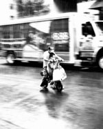 Scooter Riders in the Rain